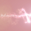 らせん軌道のパーティクルで現れる「Welcome to Our Wedding!」【ペールピンク】