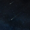 Meteor Shower in Twinkling Starry Night Sky, Looping Background
